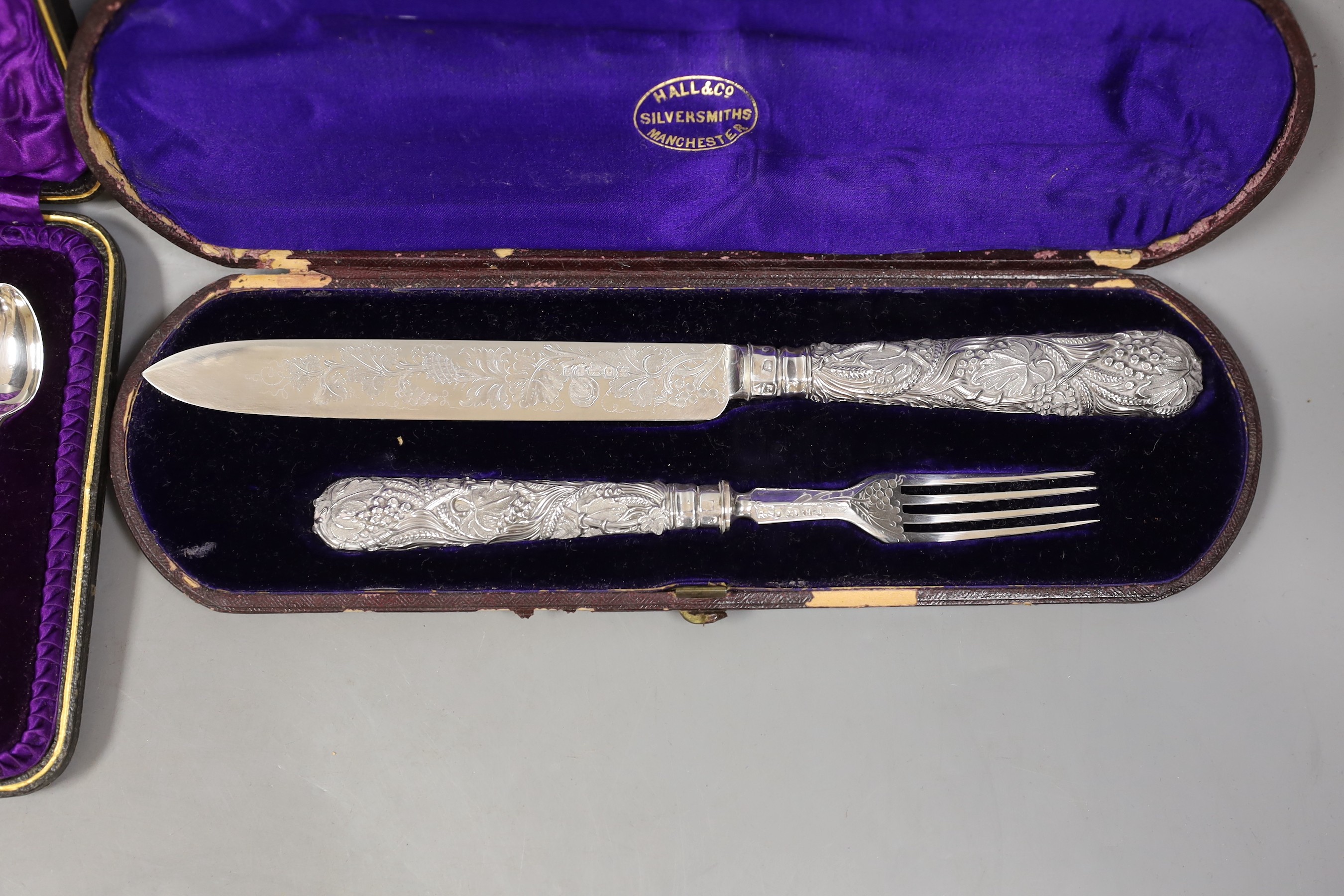 A Victorian cased silver knife and fork, Martin, Hall & Co, Sheffield, 1875 and a later cased set of six silver teaspoons and pair of sugar tongs.